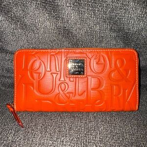 Dooney and Bourke retro embossed zip around wallet